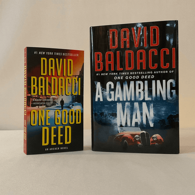 Cover of David Baldacci books.  "A Gambling Man" and "One Good Deed"