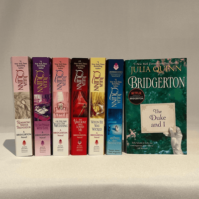 Various paperback editions of Julia Quinn's "Bridgerton" series.