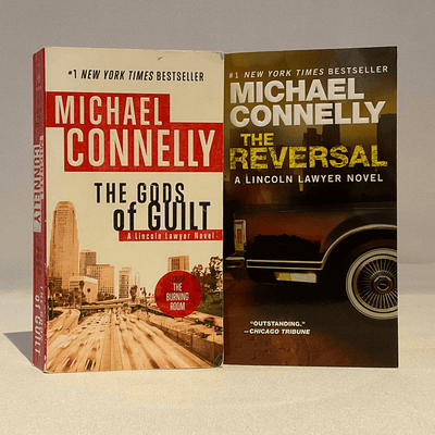 Covers of "The Reversal" and "The Gods of Guilt", a Lincoln Lawyer Novel by Michael Connelly.