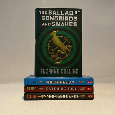 Covers of "The Hunger Games" series by Suzanne Collins.